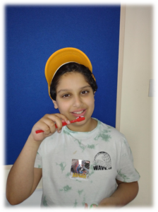 Child brushing teeth