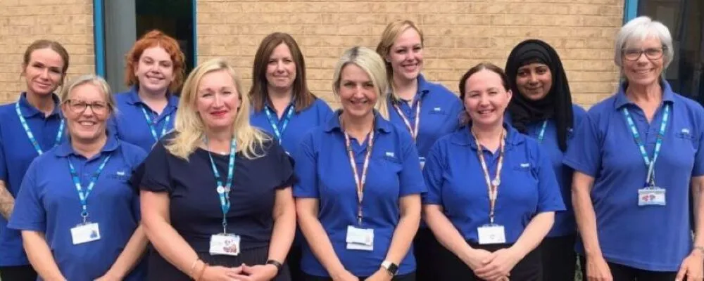 A photograph of the Oral Health Improvement team